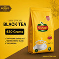 A 430 gram stand-up pouch of Nishaat Tea (Black Tea Blend) on a yellow and brown graphic background with text highlighting 'New Strong Black Tea' and '430 Grams'.